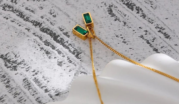 Serenade of Secrets: The Gold Necklace and Two Emerald Gems